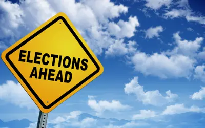 road sign reading "elections ahead"